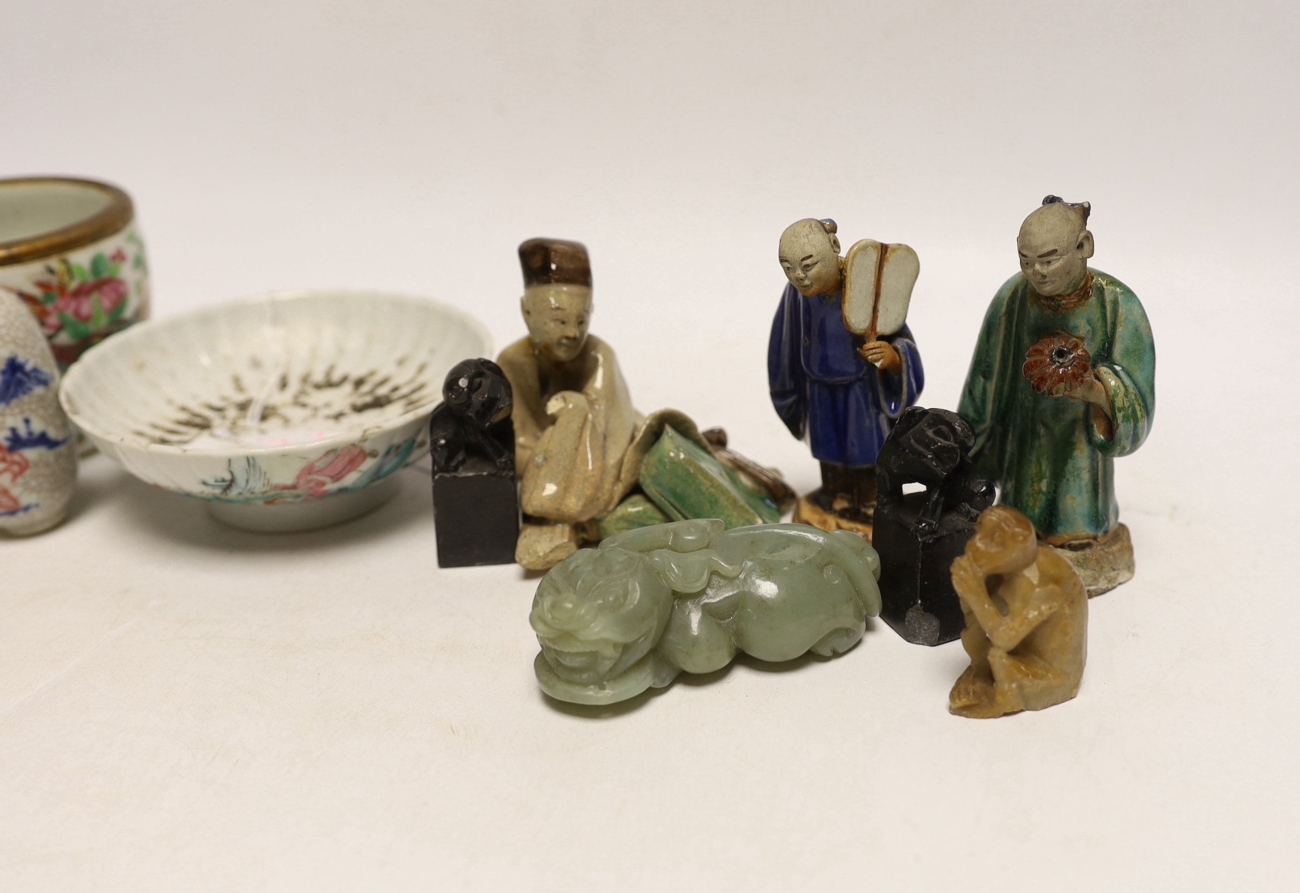 Three Chinese seals, three hardstone carvings and three pottery glazed figures and a 19th century Chinese famille rose pot, crackle glaze snuff bottle and a pedestal dish, 11.5cm